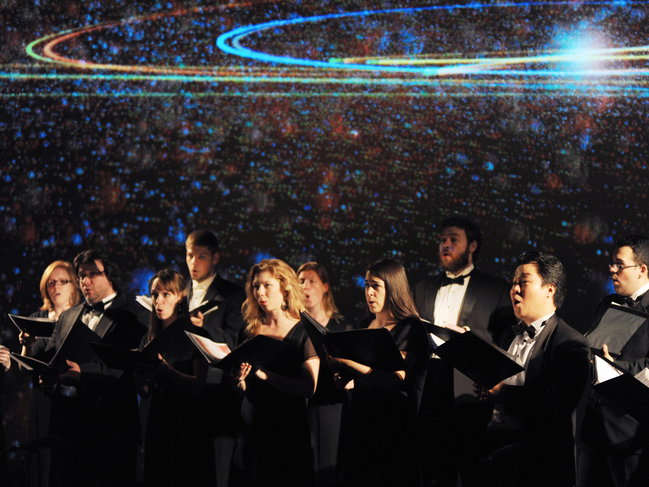 choir singing with galaxy background